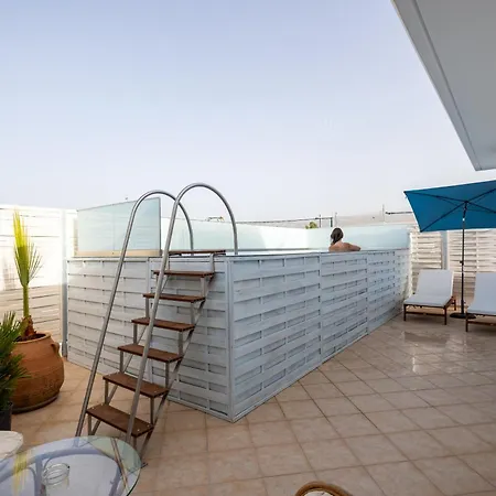 With Heated Rooftop Pool
