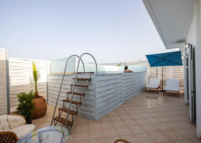 With Heated Rooftop Pool